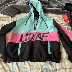 colorful windbreaker from Rue 21. size m. half zip. good condition.